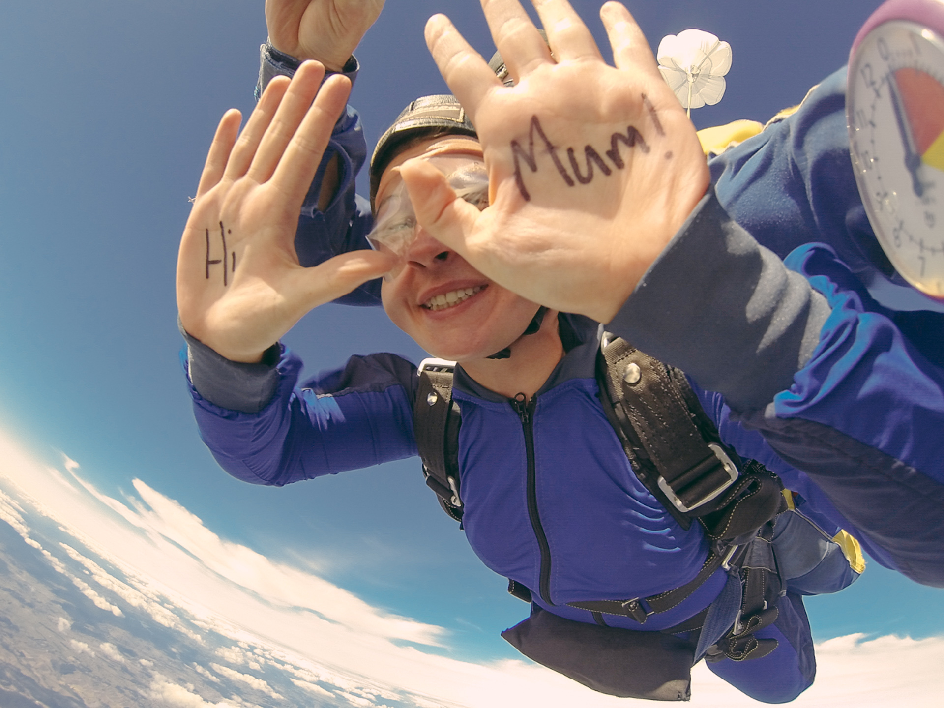 Funny things to write on hands Skydiving over Taupo New Zealand - Kiwi Experience Bus