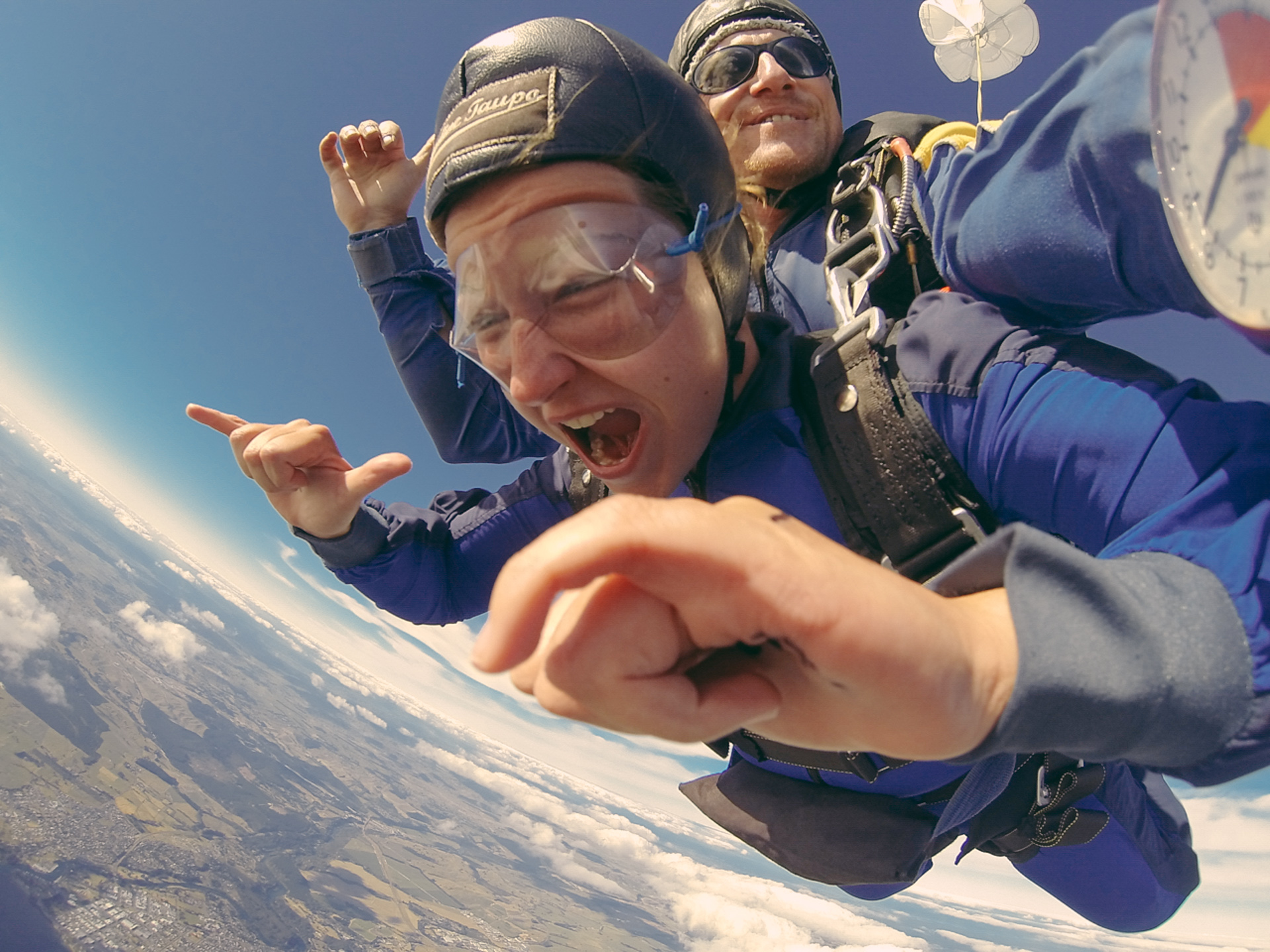 Alis Skydiving over Taupo New Zealand - Kiwi Experience Bus