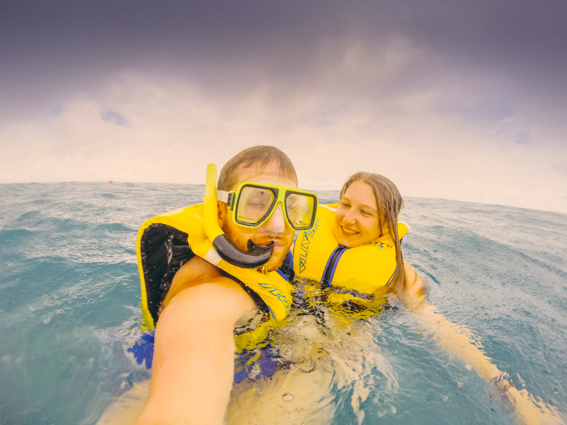 Swimming in the rain in Fiji near South Sea Island