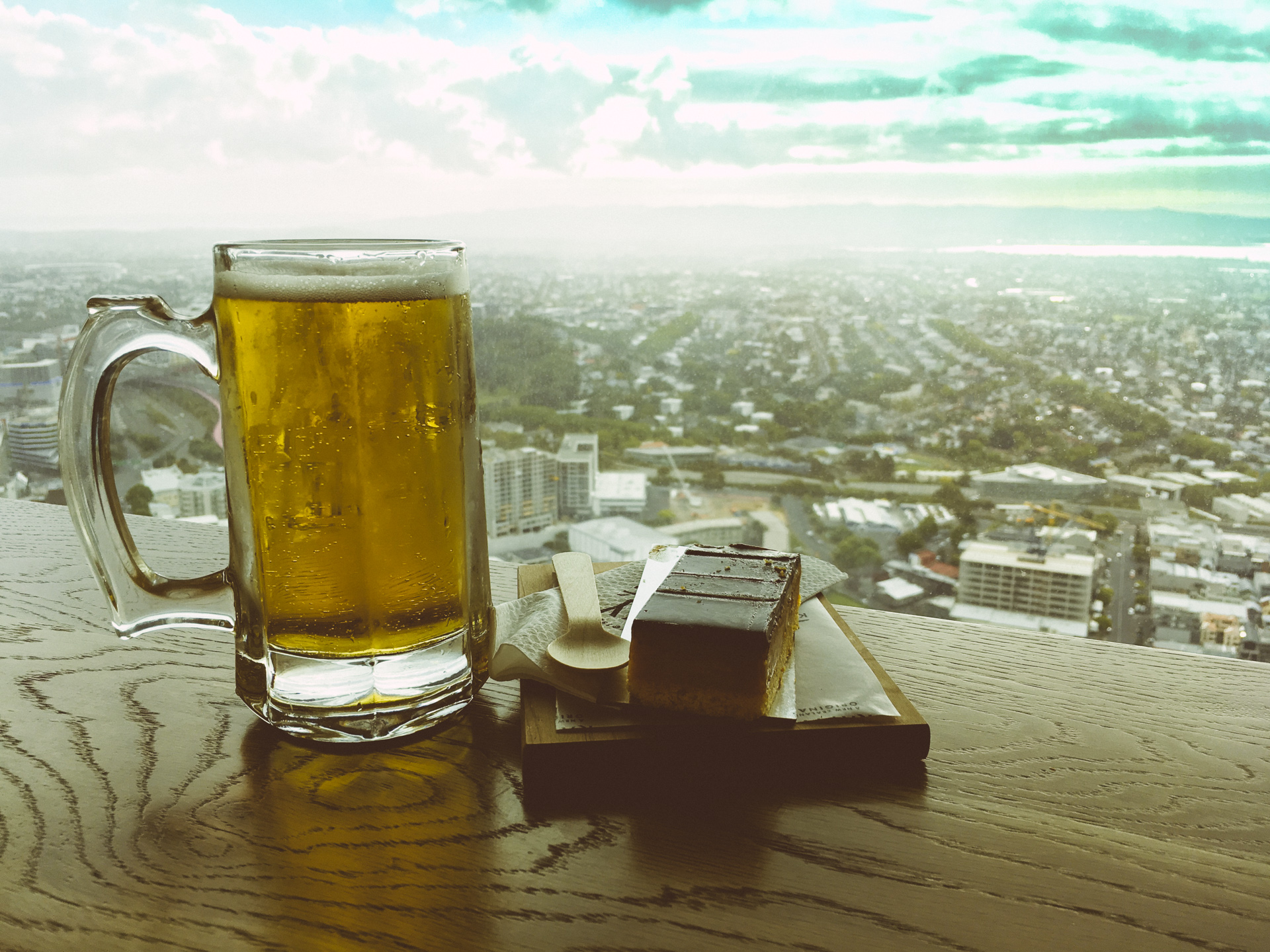 Enjoying a beer from Sky Tower Auckland