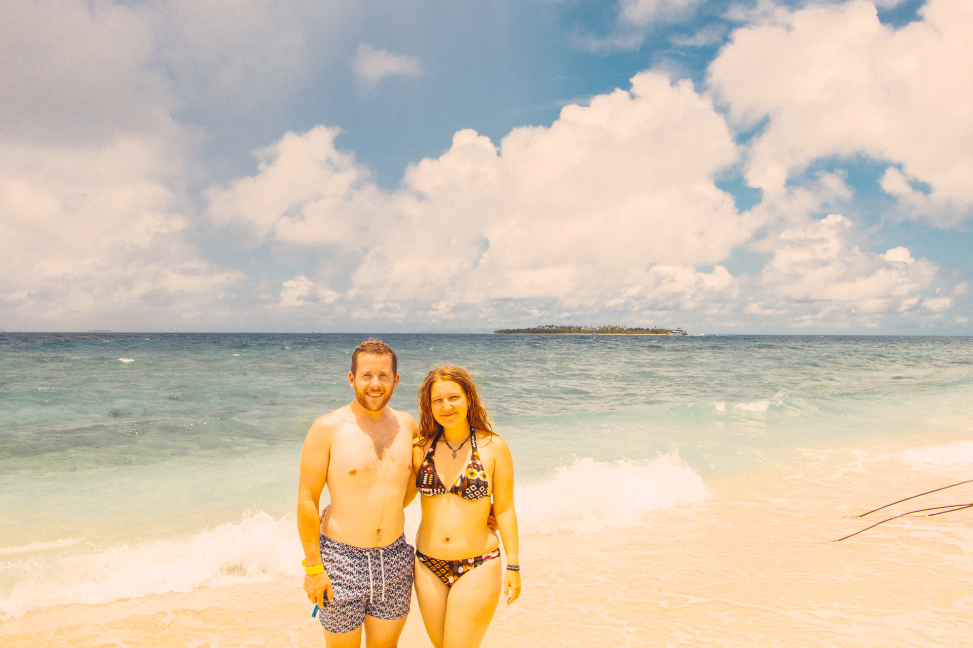 Alex and Alis on golden beach at South Sea Island, Fiji