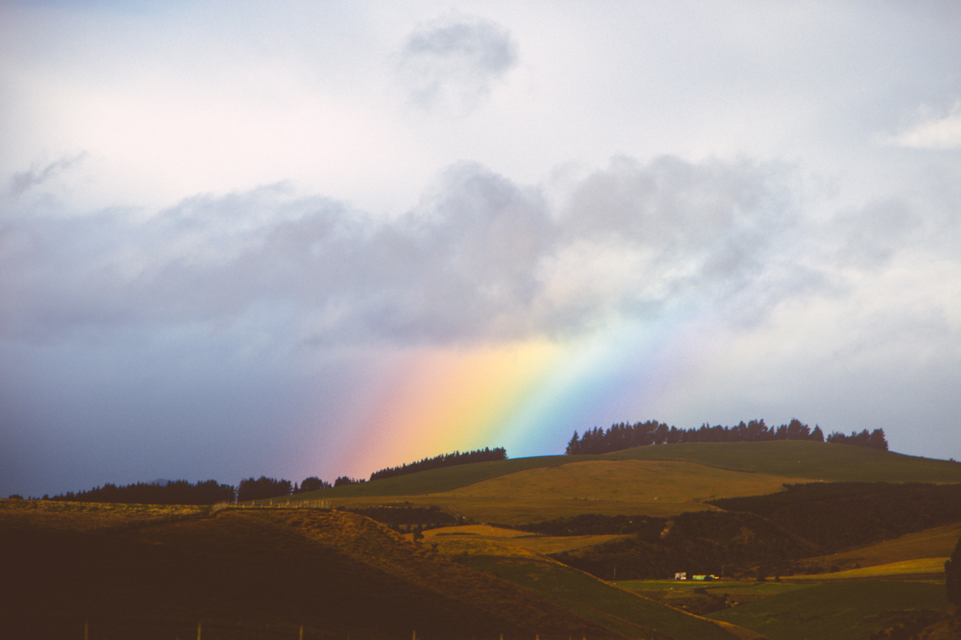 Rainbow over New Zealand Mountains