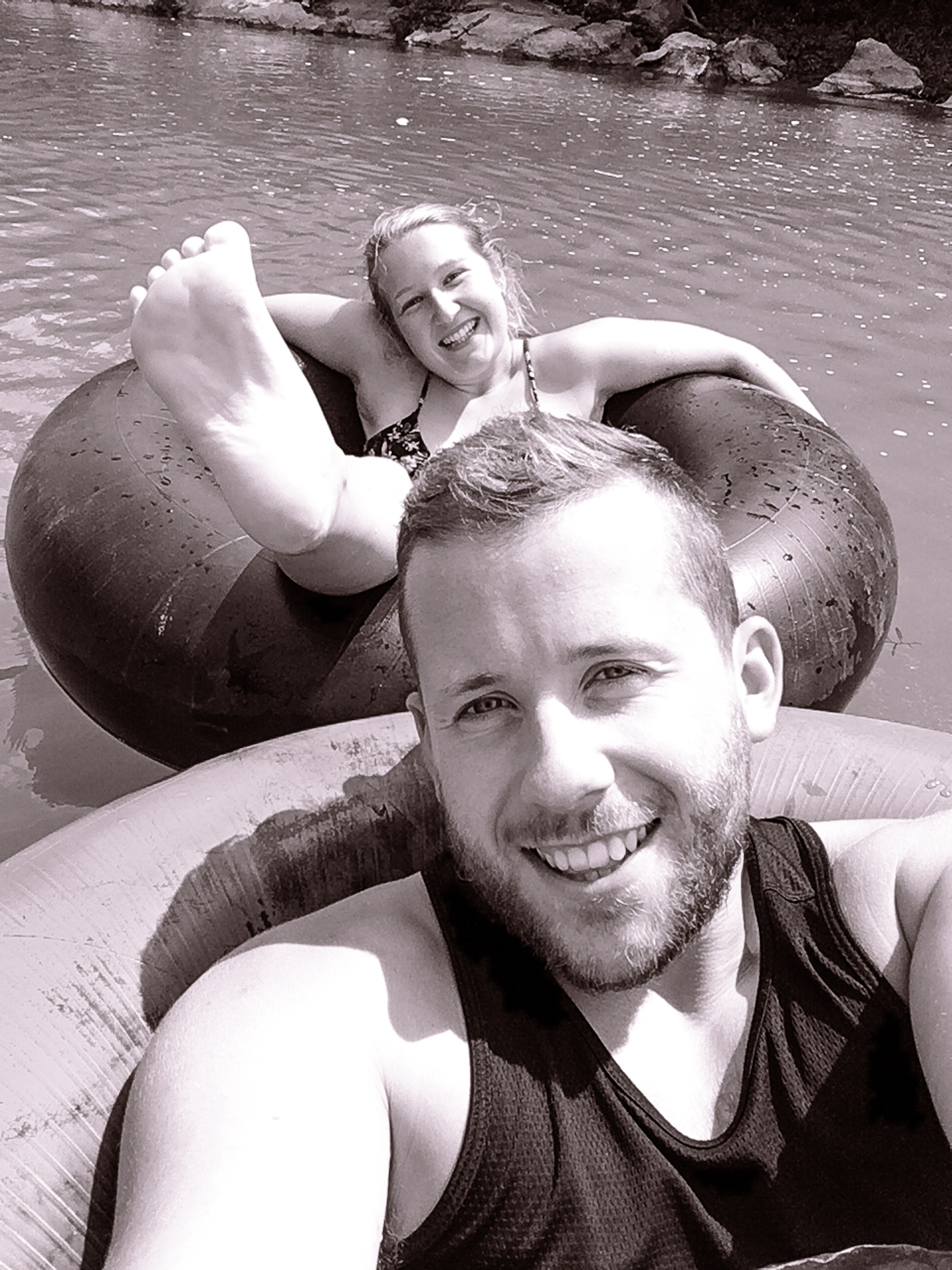 Alex and Alis Digital Nomads Float on River in Vang Vieng