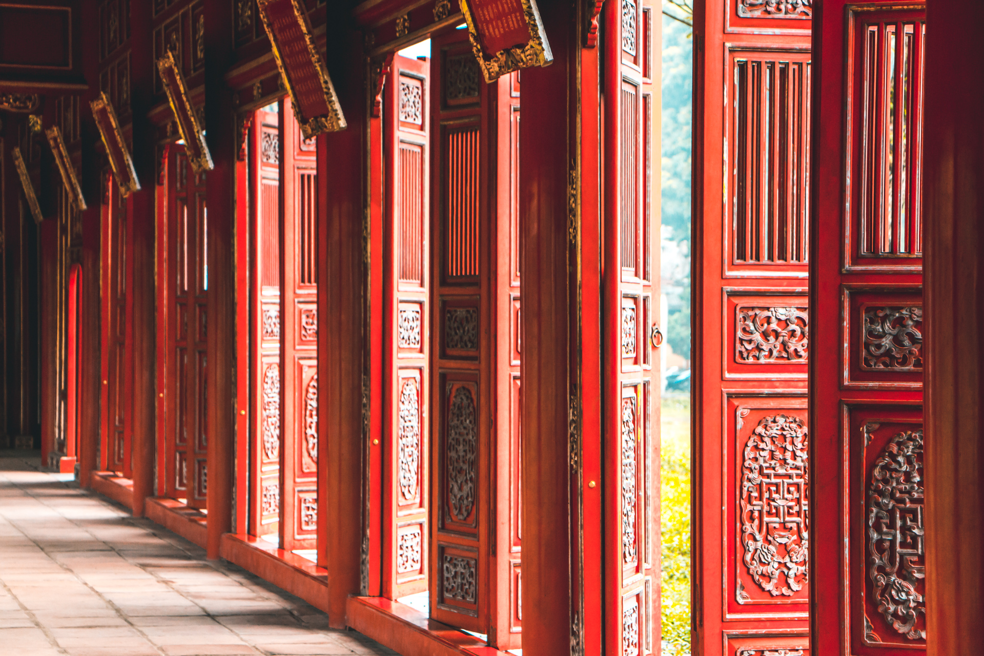 Vibrant Red Traditional Doors in Hue Citadel, Vietnam